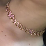 alt="Butterfly Cuban Link Choker in Gold with pink rhinestones 15 1/2 inches long"