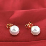 alt="a pair of pearl stud earrings Gold Plated Copper 8mm Simulated White Pearl"