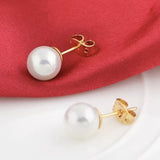 alt="a pair of pearl stud earrings Gold Plated Copper  8mm Simulated White Pearl"