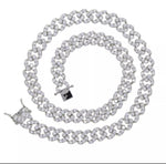 alt="Cuban Link Necklace in Silver 9mm wide and 16 inches long with double clasp"
