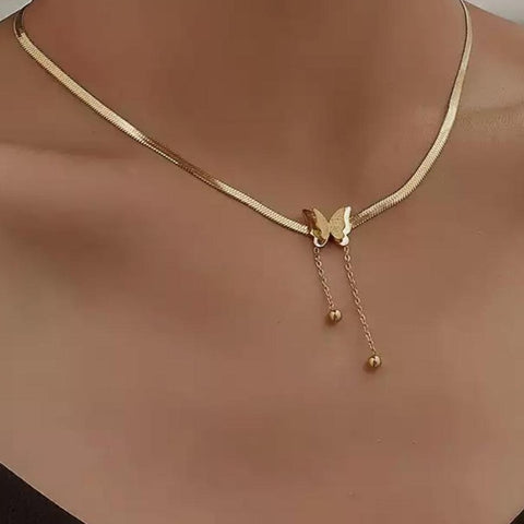 alt=" Gold Herringbone Necklace with a small gold butterfly in the middle" 